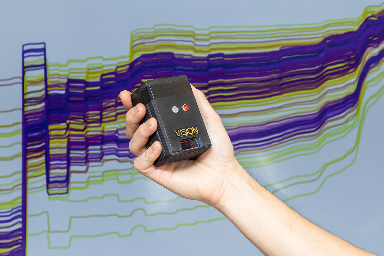 An engineer uses VISION to monitor machine performance in real time by analyzing vibration data, tracking power draw and operational modes that may cause damage.